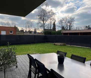 Ruim gelijkvloersappartement met 2 slaapkamers en tuin - Foto 1