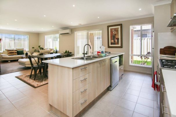 A PERFECT NEAT AND TIDY FAMILY HOME IN PRIME LOCATION - Photo 1