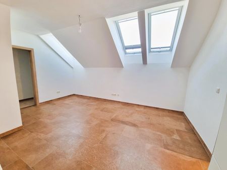 Neuwertige 2-Zimmer-Dachgeschosswohnung mit Balkon und Fernblick - Foto 3