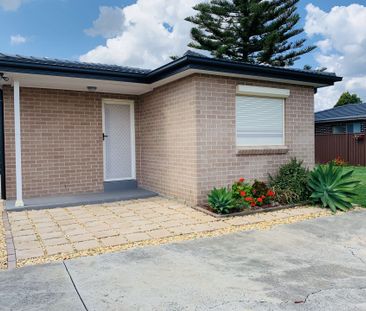 Spacious 2-Bedroom Home with Large Private Yard - Photo 6