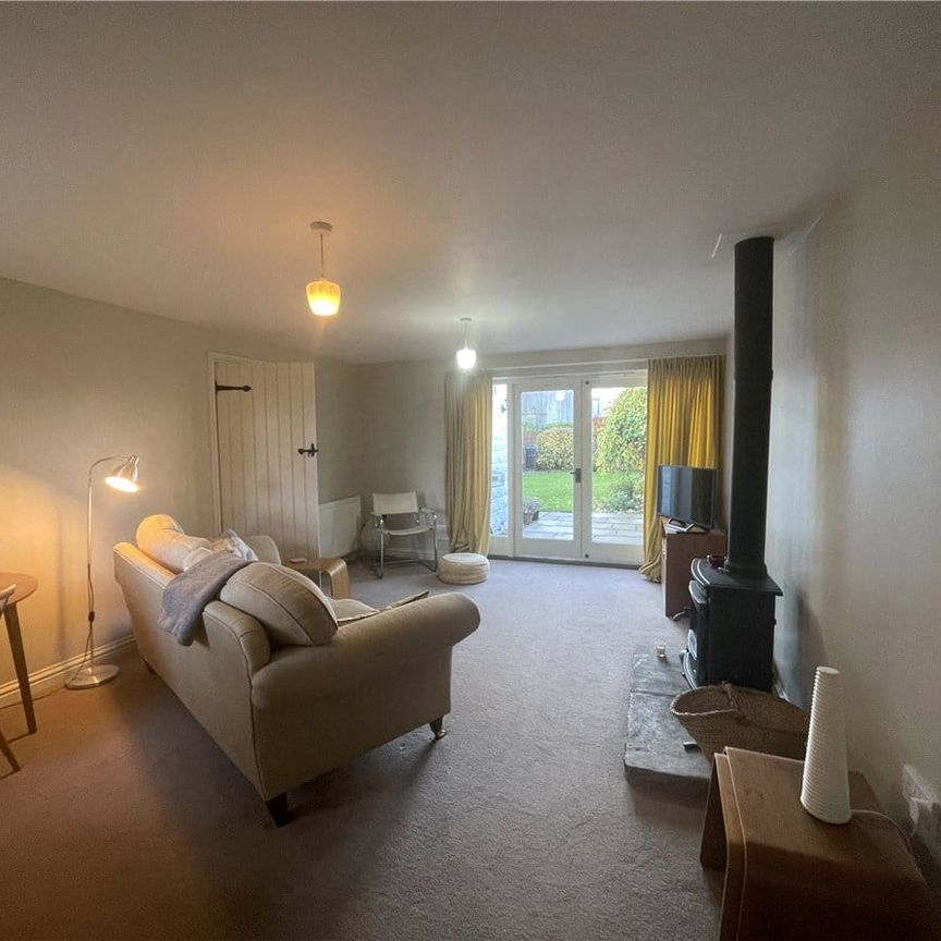 The Old School Rooms is a semi-detached cottage. It consists of a kitchen, utility room, living room with a multi-fuel stove, bathroom, downstairs WC and two bedrooms. The property benefits from oil central heating, off road parking and an enclosed rear garden. - Photo 1