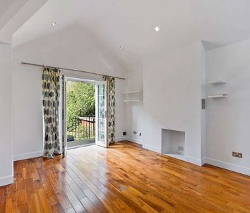 A spacious first floor apartment located within a gated development - Photo 1