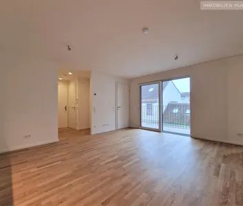Top-City-Lage mit großem SÜD-Balkon - nähe Bahnhof Meidling! - Foto 2