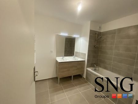 T4 AVEC LOGGIA + PARKINGS - Photo 5