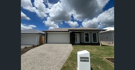 NEAR NEW 4 BEDROOM FAMILY HOME - Photo 4