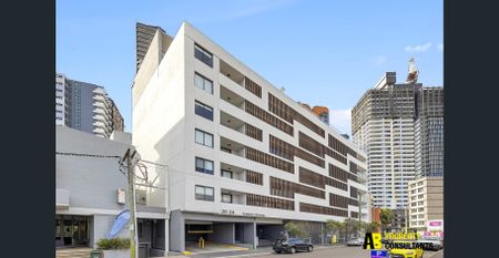 Luxury Meets Location: Modern 1-Bedroom Apartment in the Heart of Harris Park - Photo 2