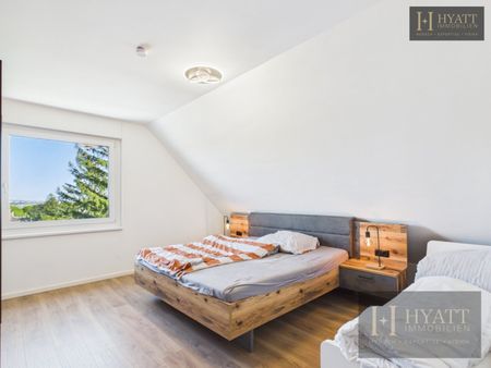 Architektonisches Dachgeschossjuwel mit Terrasse und außergewöhnlichem Wohngefühl - Photo 4