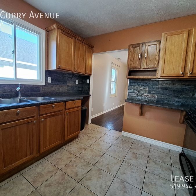 2 Bed 1 Bath Single Family Home w Off Street Parking and Fenced in Yard!! - Photo 1