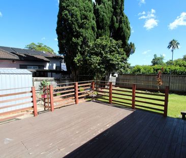 Lovely family home with additional sleep out! Great location with b... - Photo 4