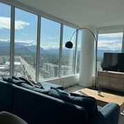 Fully Furnished Downtown Luxury Condo with Pool - Photo 2