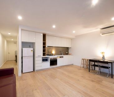 Spacious Semi-Furnished 1-Bedroom Apartment with Private Courtyard ... - Photo 2