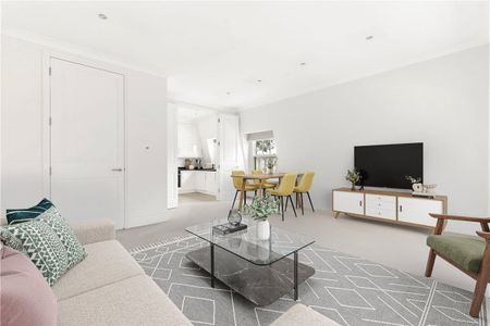 A fabulous, well presented and naturally bright three bedroom lateral apartment set on the third floor of this detached period villa on one of the most sought-after roads in Holland Park. Tenancy Length: Minimum 12 months EPC rating: C | Council Tax Band H - Photo 2