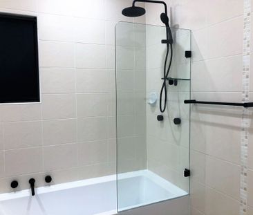 Renovated 2 bedroom unit in central location - Photo 2