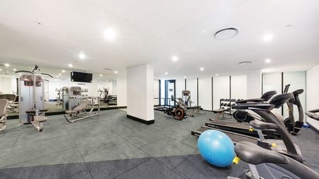 Spacious & Furnished 1-Bed Apartment I Tiled & Timber Flooring I Gym & Pool - Photo 4