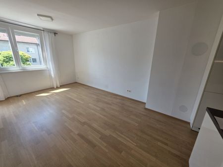 Helle 2 Zi Neubauwohnung mit hofseitiger Loggia in absoluter Ruhelage - Foto 2
