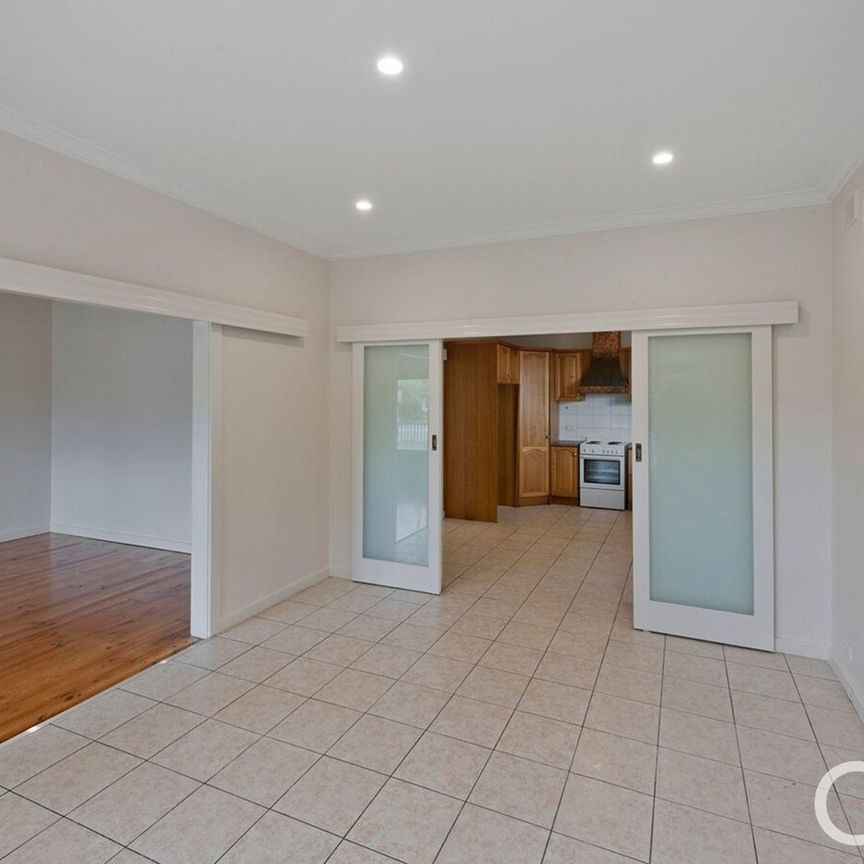 Open the door to a beautifully four-bedroom family home - Photo 1