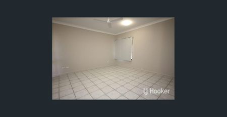Spacious 4 Bedroom Home with Backyard Patio in Kirwan - Photo 3
