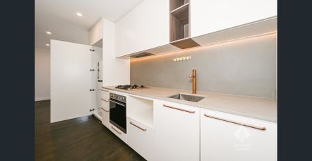 Sleek Urban Living at Its Finest I Unfurnished with Car Stacker - Photo 3