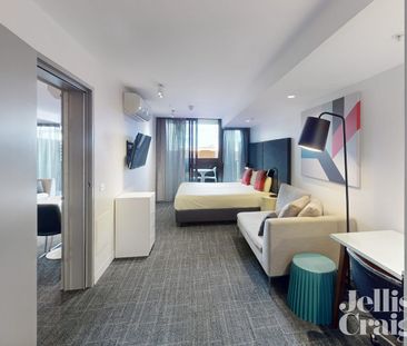 Hotel living right in the action! - Photo 1