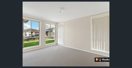 FOUR BEDROOM HOME PERFECT FOR THE FAMILY! - Photo 4