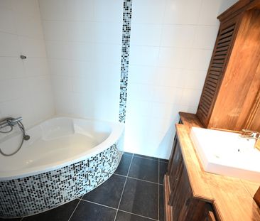Woning met zonnige stadskoer. - Foto 1