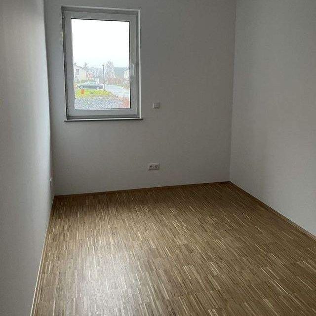 Lieblingsplatz mit attraktiver Ausstattung, moderner EBK und Terrasse im Erstbezug! - Foto 1