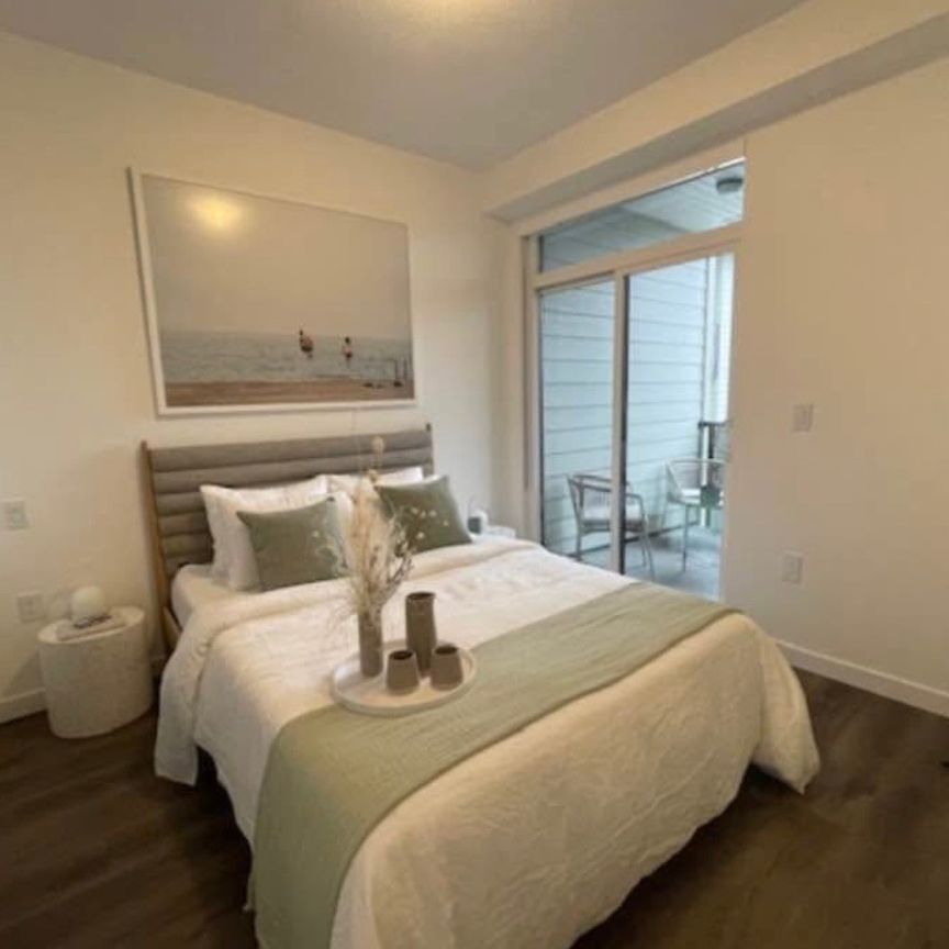 Unit 114- Beautifully Designed/ 2 Bedrooms Plus Den Condo at The Grove - Photo 1