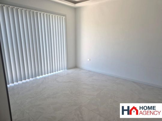 FULLY RENOVATED 4 BEDROOM HALF HOUSE (Top Level) - Photo 1