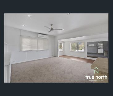 Charming Three-bedroom with a Large Backyard! - Photo 1