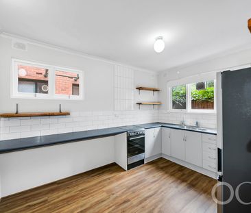 Open the Door to a Private Courtyard Retreat with Northern Light - Photo 6