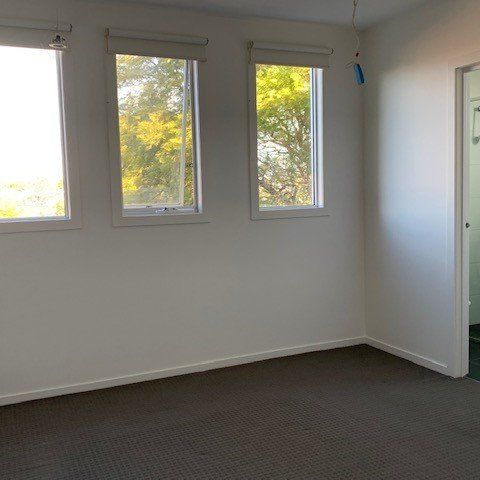 SUN DRENCHED 2 BEDROOM BEAUTY IN HOT SPOT! - Photo 1
