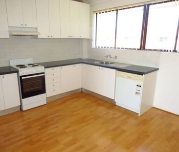 NORTH FACING LIGHT FILLED TWO BEDROOM APARTMENT WITH LOCK UP GARAGE - Photo 2