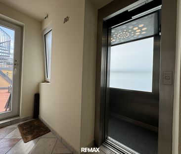 Außergewöhnliche Dachgeschoss-Maisonette mit Dachterrasse und beein... - Foto 1