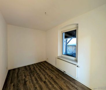 Gemütliche Erdgeschosswohnung mit Einbauküche - Photo 1