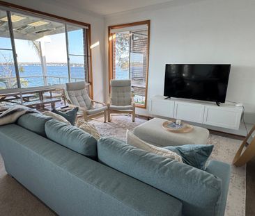 ABSOLUTE WATERFRONT LIVING - FULLY FURNISHED & READY TO ENJOY! - Photo 2