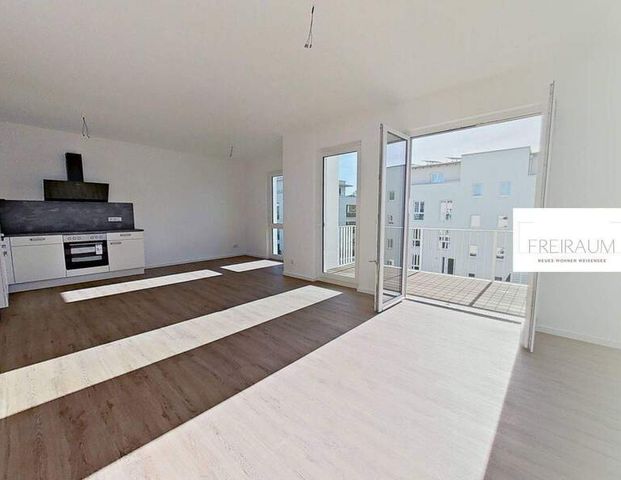 EIN NEUER LEBENSRAUM: Weitläufige 3-Zimmer-Wohnung mit BALKON und EBK im Weißenseer Neubauquartier FREIRAUM - Photo 1