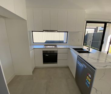 Near New Granny Flat with Quality Inclusions + Garage - Photo 2