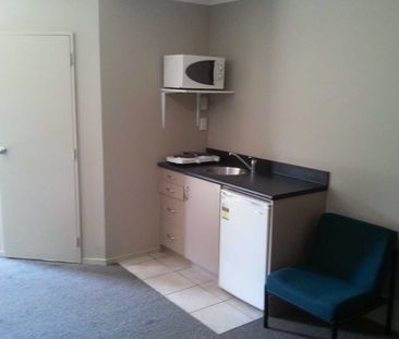 This large self contained studio room wont last long. - Photo 1