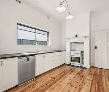 Charming Three-Bedroom Character Home - Photo 4