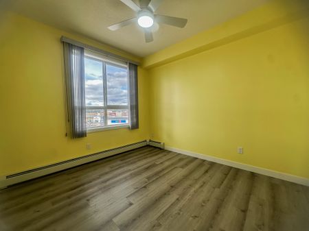 Sunlit 2 Bed + 2 Bath Condo With A/C In Walden | Underground Parking - Photo 3