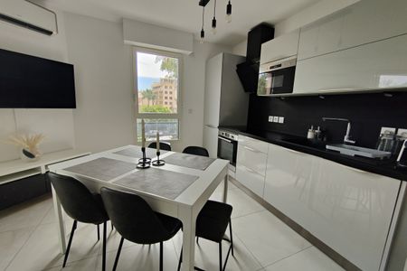 LOCATION - APPARTEMENT 2 PIECES DE 46,67m2 AVEC TERRASSE ET - Photo 3