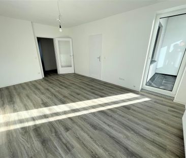 Moderne 3-Zimmer-Etagenwohnung mit Laminat und großem Balkon in Wol... - Photo 1