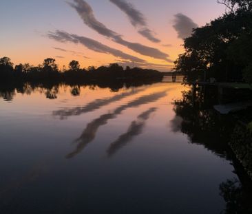 Freshly renovated, riverside living at its finest - Photo 2