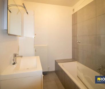Nabij centrum gelegen instapklaar gelijkvloers appartement met 1 sl... - Photo 4