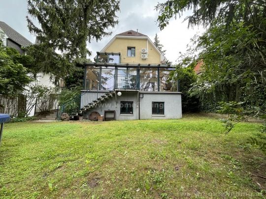 Einfamilienhaus mit schönem Garten nahe Mauer - Foto 1