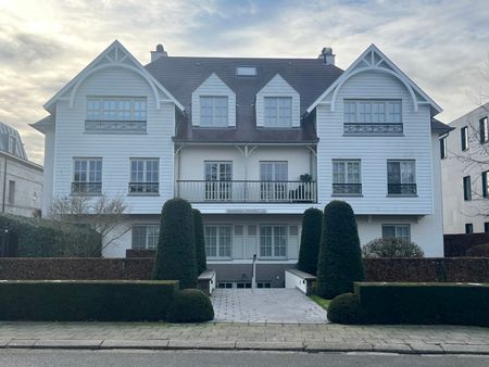 GELIJKVLOERS APPARTEMENT MET OVERDEKT TERRAS EN TUIN - Photo 2