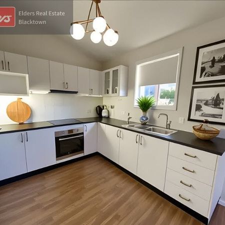 Home Sweet Home! - NO LAWNS TO MAINTAIN, 2 DRIVEWAY CAR SPACES, 2 TOILETS - Photo 3