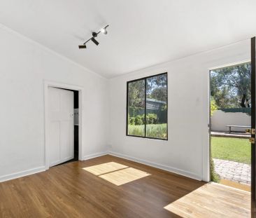 Comfortable rental property offering that backs into a park - Photo 1