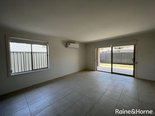 Four bedroom home in Andrews Farm with second living! - Photo 1