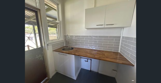 Charming 3 Bedroom Home - Photo 1